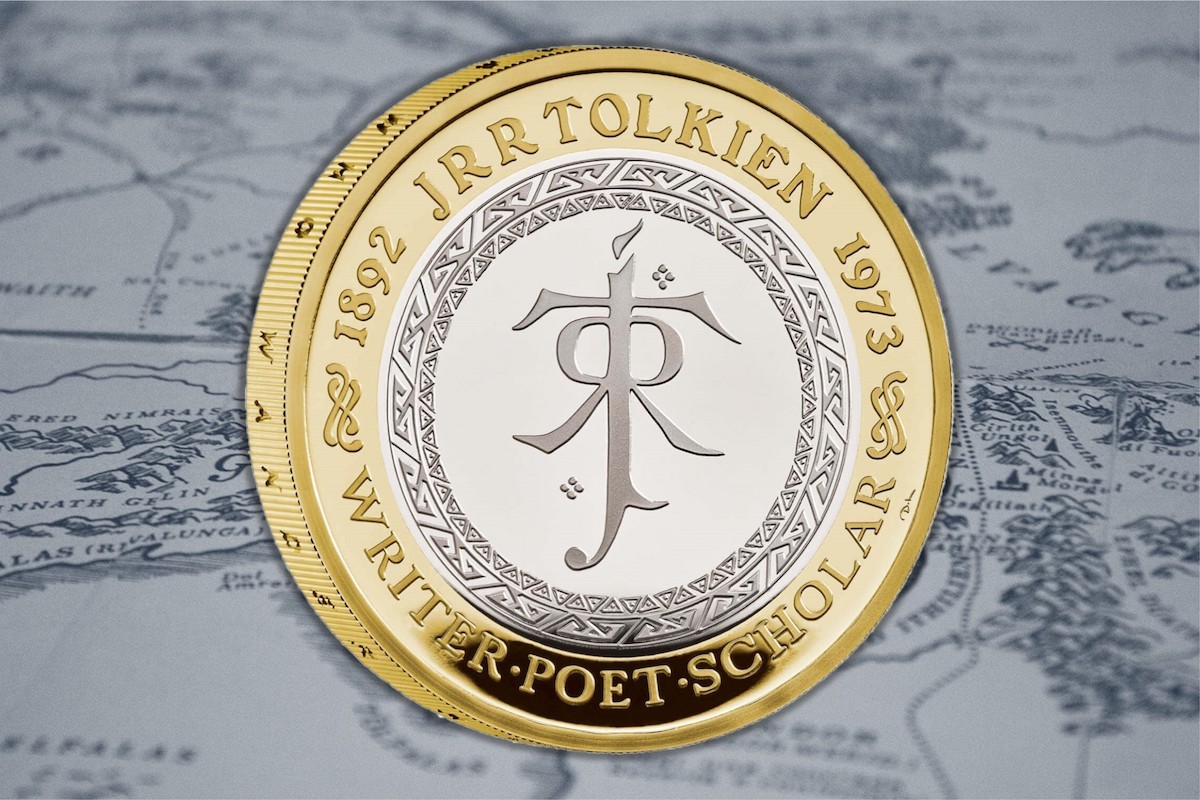 This official J R R Tolkien 2023 coin features letting and runic symbols associated with the author and his Lord of the Rings series. 