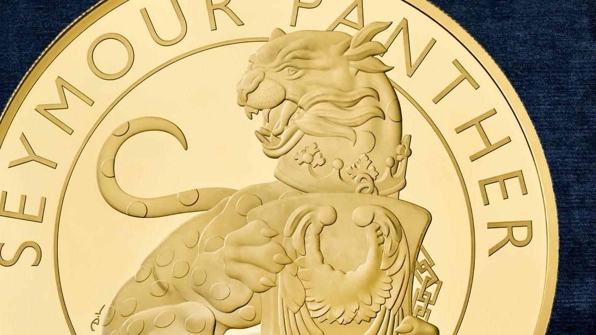 Close up of a gold Seymour Panther coin, the first release in the Tudor Beasts series.