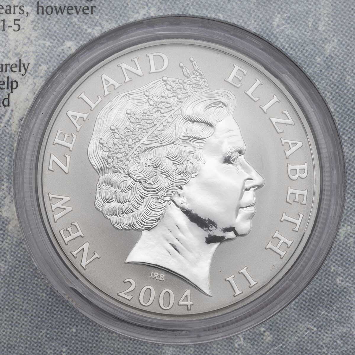 NZ04KS1 2004 Little Spotted Kiwi One Ounce Silver Brilliant Uncirculated New Zealand Carded Coin royal obverse effigy