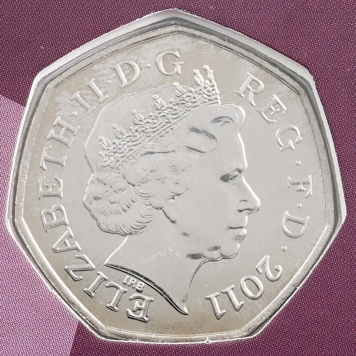 2011 Brilliant Uncirculated Fifty Pence Aquatics Coin from the London 2012 Sports Collection Coin obverse featuring Queen Elizabeth II 4th portrait as designed by Ian Rank Broadley