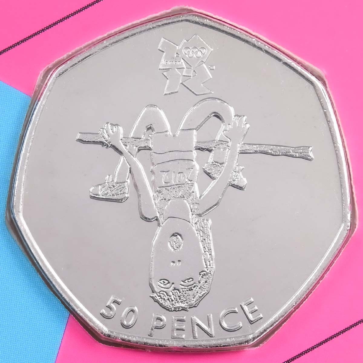 Brilliant Uncirculated 2011 Fifty Pence Athletics Coin, featured in the London 2012 Sports Collection Coin reverse featuring an olympic shooter designed in an open public competition by Florence Jackson