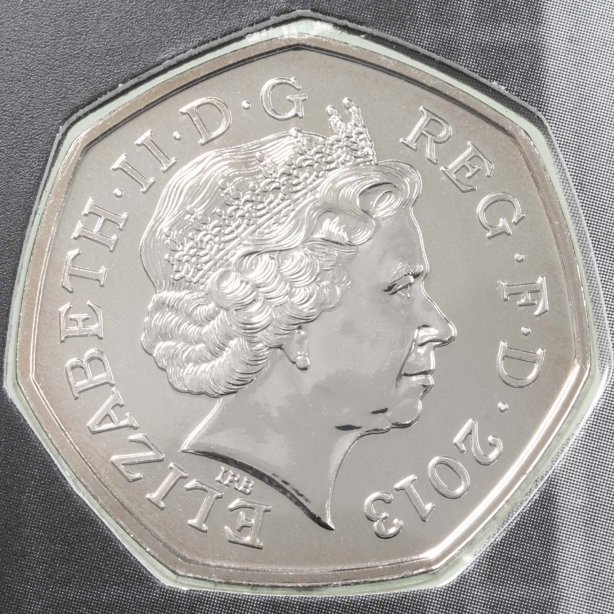 UK13RSBU 2013 Christopher Ironside Royal Arms Fifty Pence Brilliant Uncirculated Coin In Folder Obverse