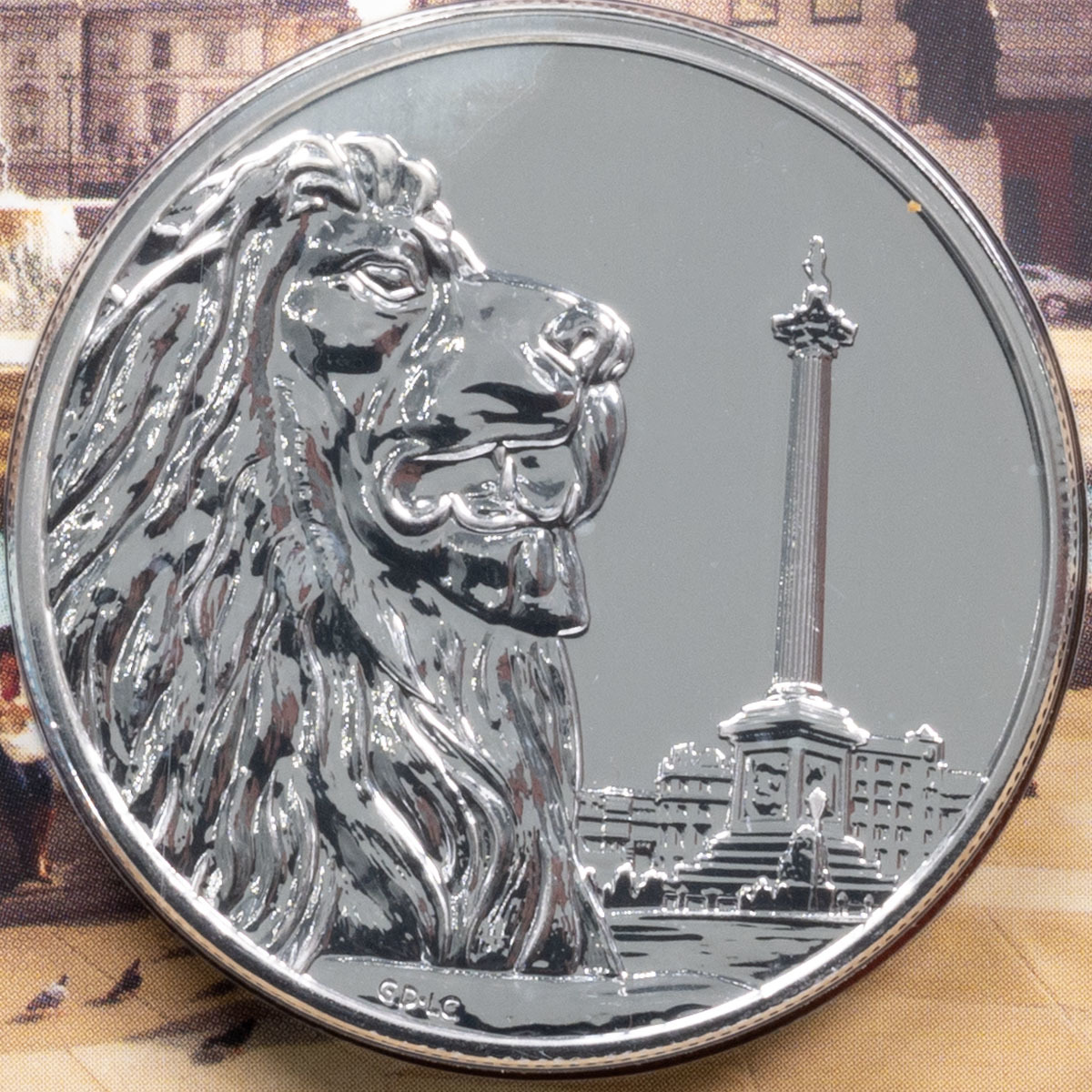 UK16100P 2016 Trafalgar Square One Hundred Pound Silver Brilliant Uncirculated Coin In Folder Reverse
