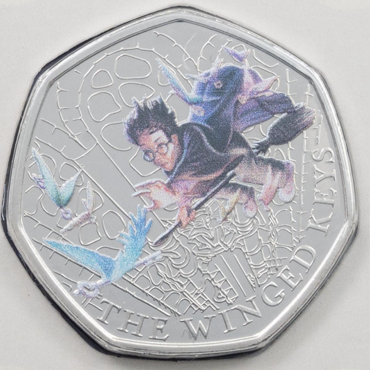 UK24HPBUC 2024 The Winged Keys Fifty Pence Coloured Brilliant Uncirculated Harry Potter Coin reverse design